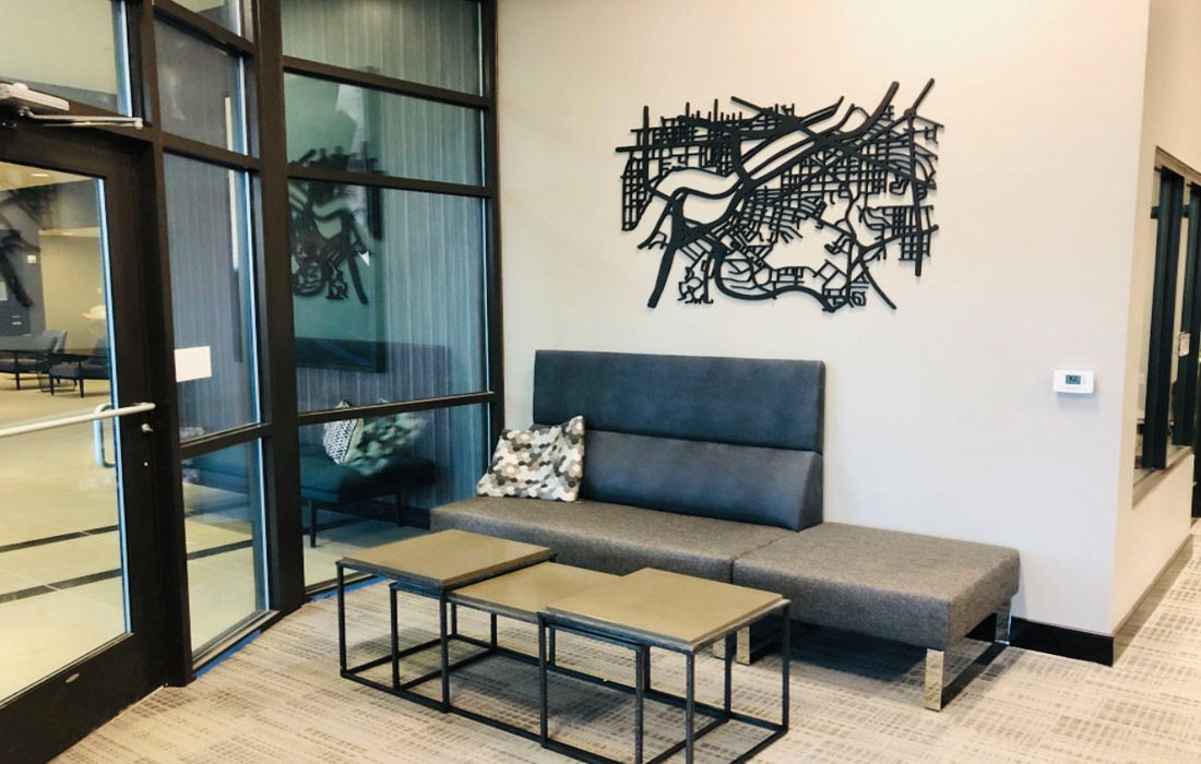 Maple View Flats - seating outside rental office